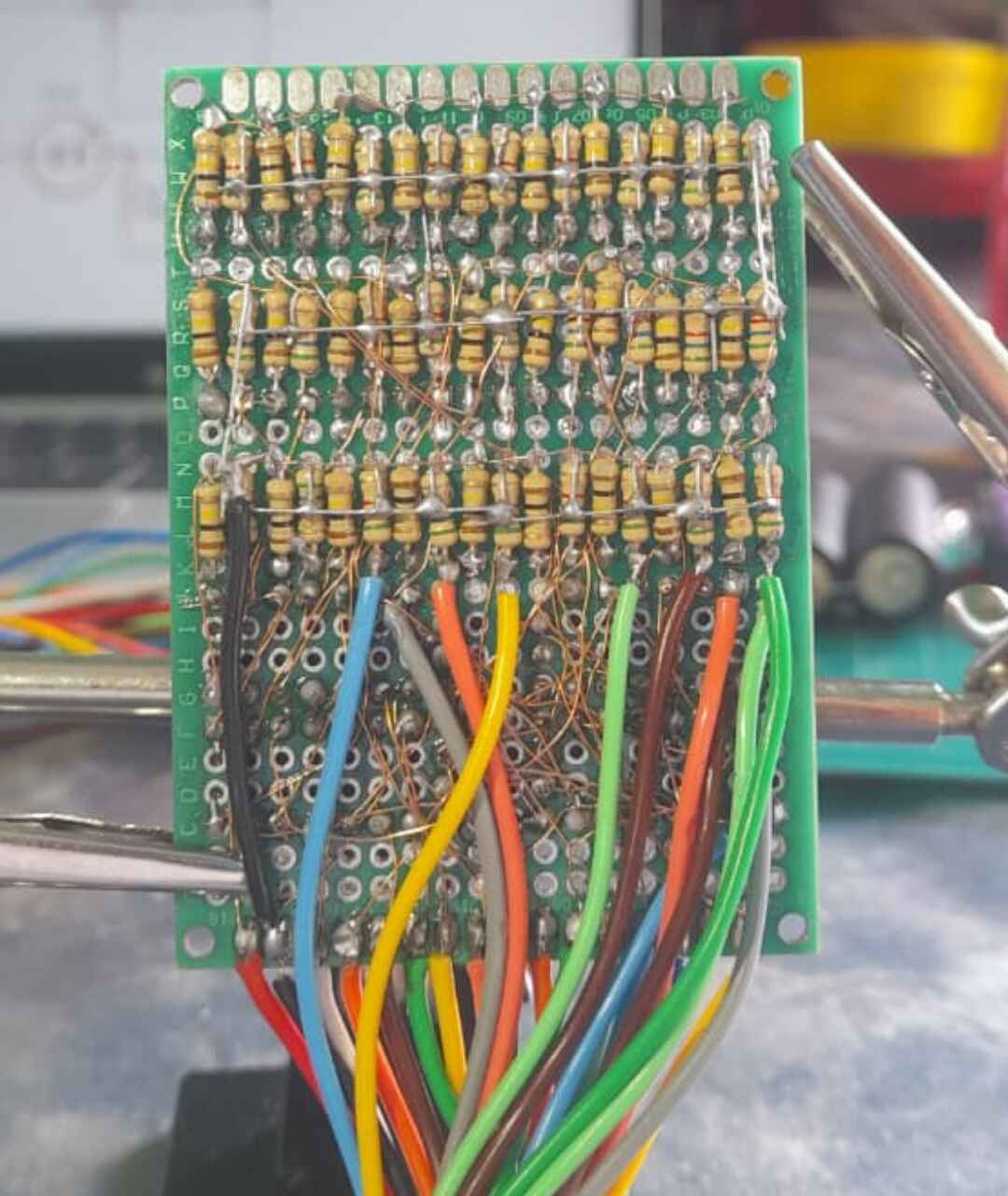 Al Amin Sani working on particle detector hardware